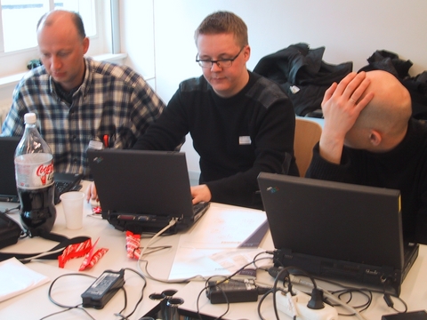 Niels Mache, Heimo Laukkanen and Robert Boulanger talking business